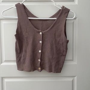 tank with marble buttons